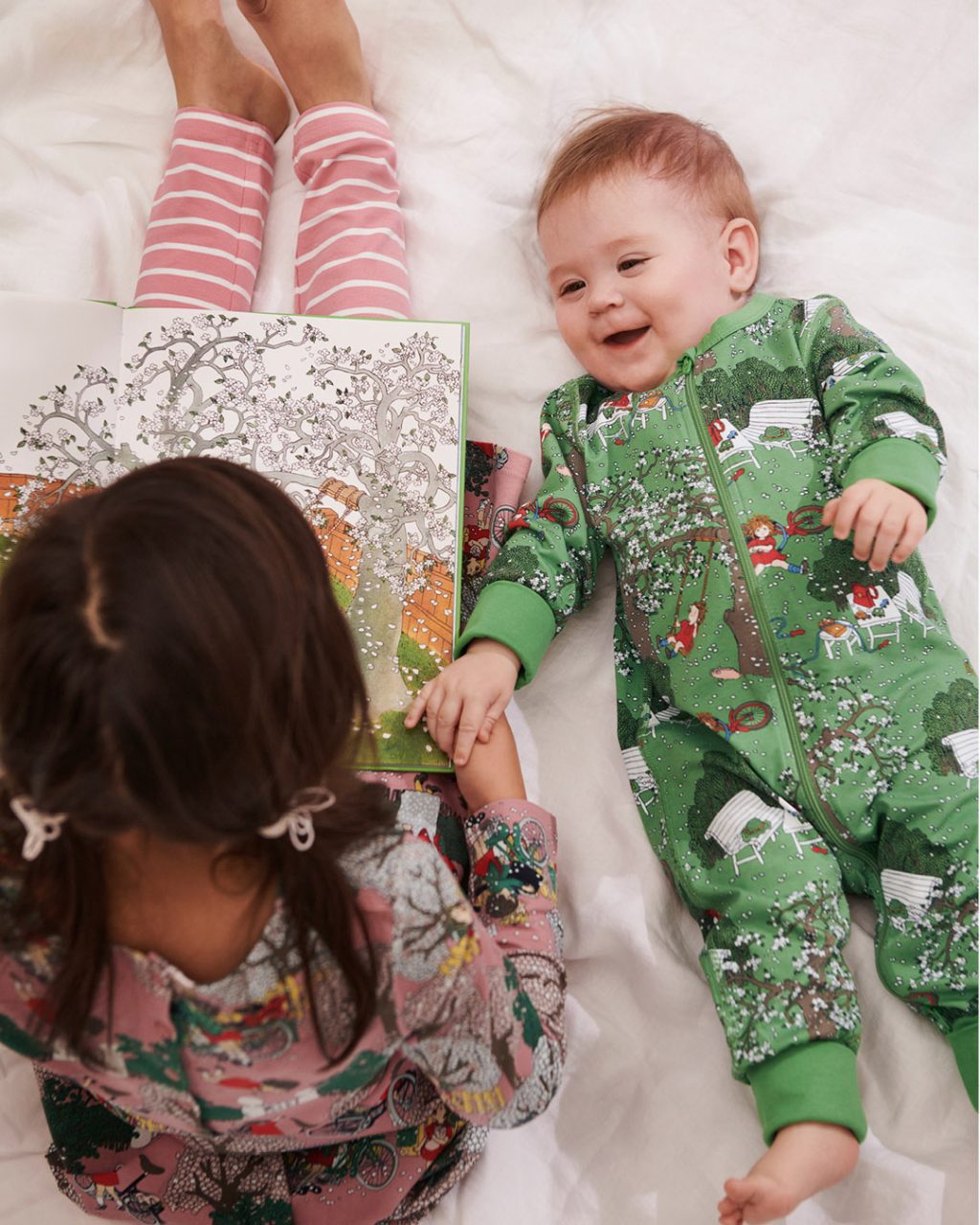 Baby and girl in Polarn O Pyret Astrid Lindgren Ilon Wikland collection