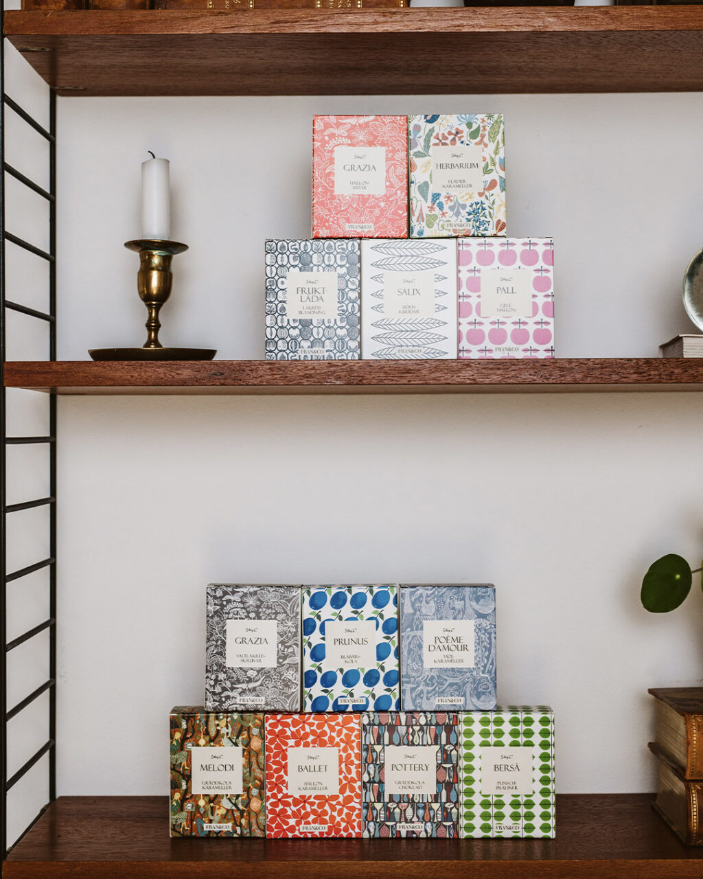 Boxes with candy on shelf