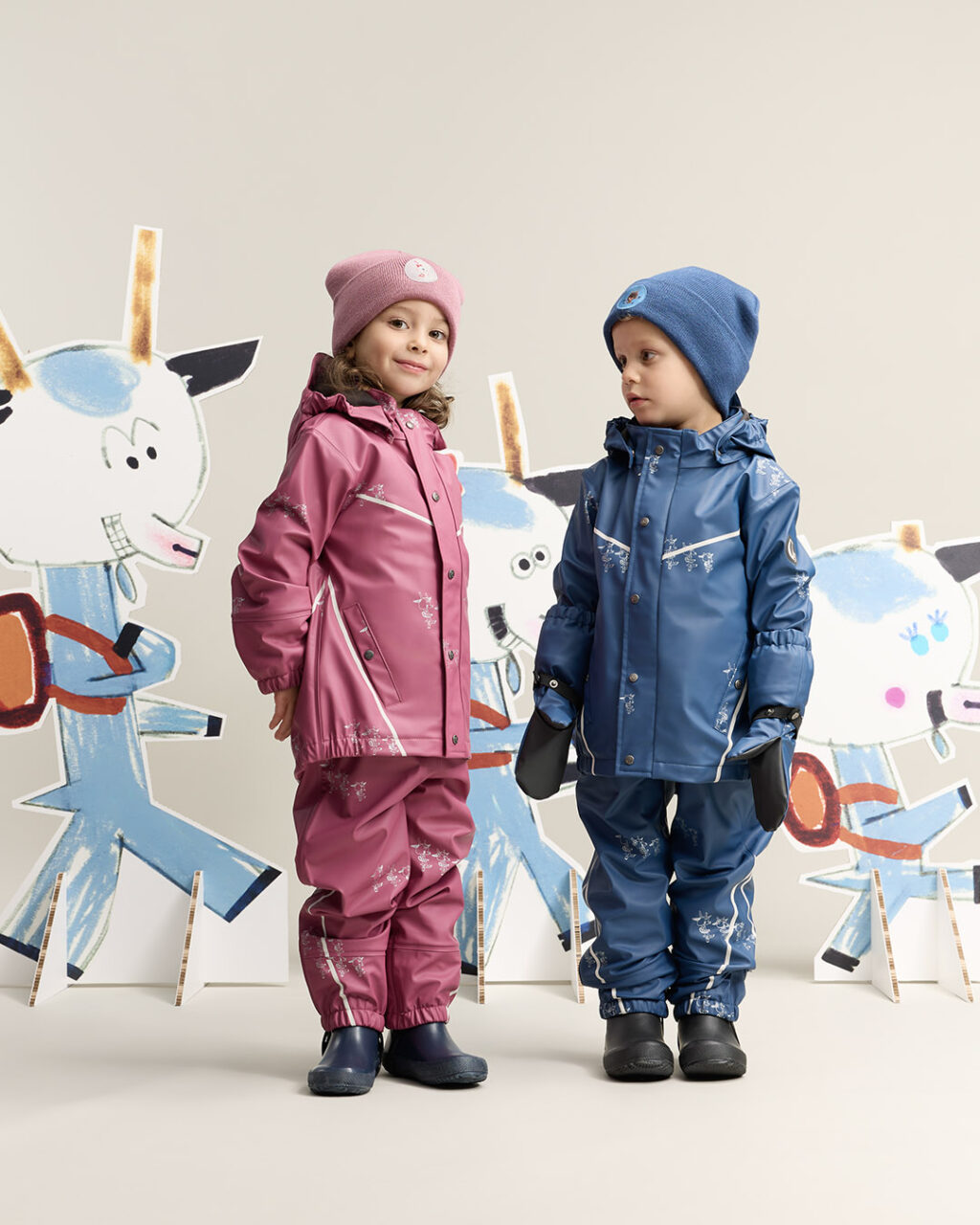 two children wearing gullkorn rainwear
