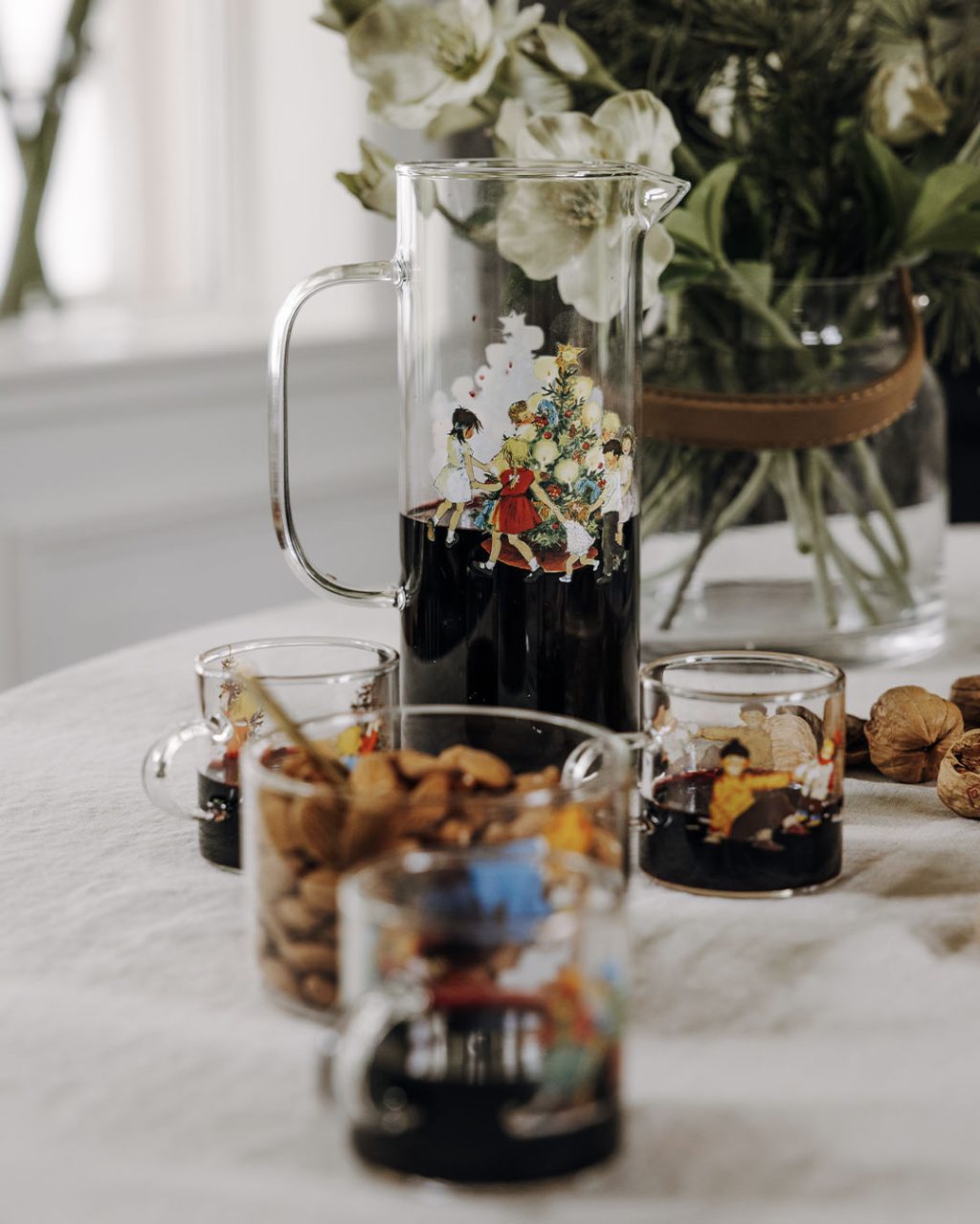 glass jug with noisy village illustration